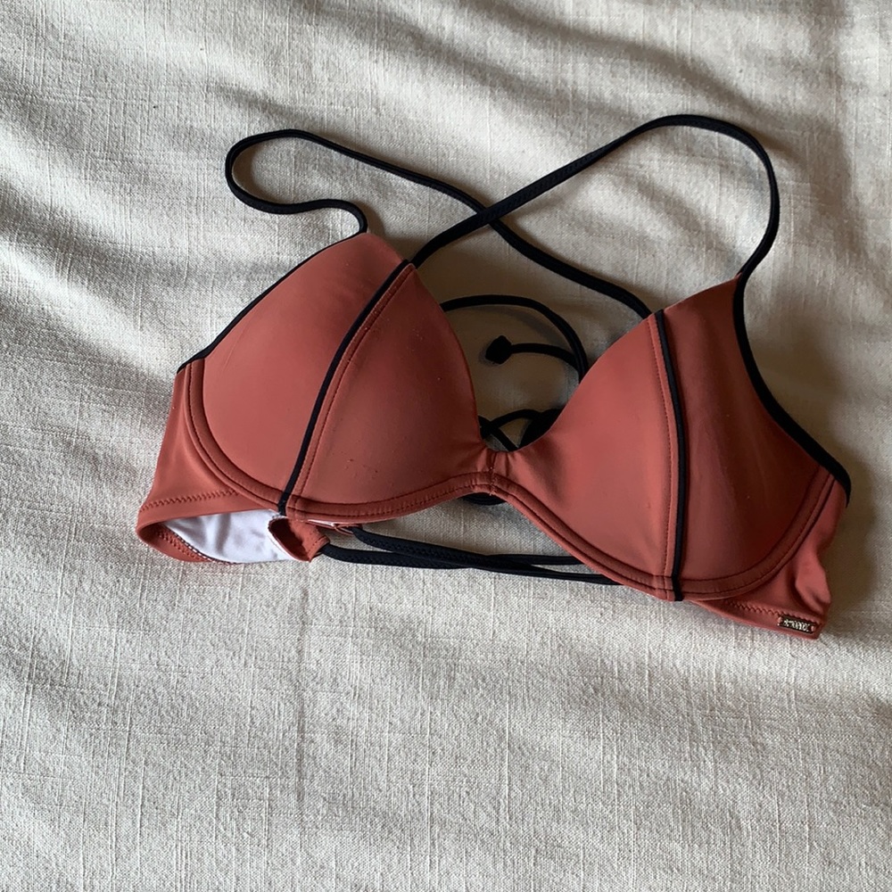 Pink swim top.